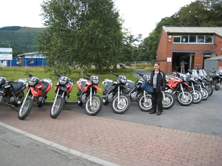 Tracy with the bikes outside the Off Road School
