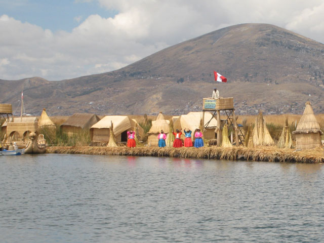 Lake Titicaca islanders try to entice us to visit them...