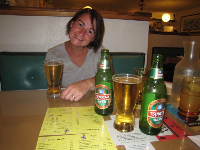 Tracy enjoys a cold beer waiting for her Chinese in Cortez